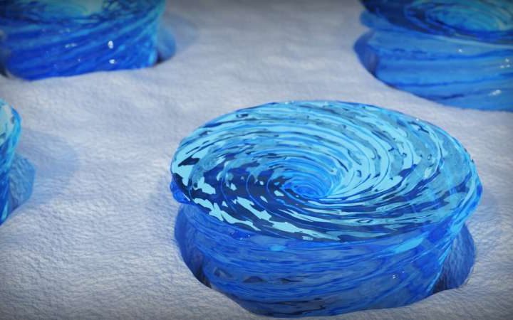 Nanoislands on silicon enable switchable topological textures for new electronic applications