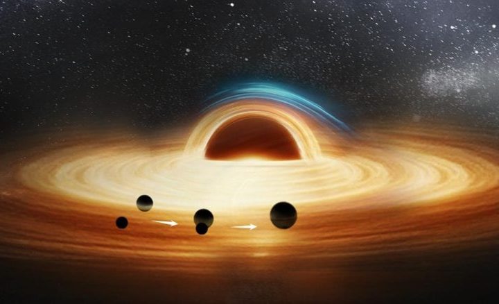 Astronomers Uncover “Mysterious Giant” Lurking Behind Binary Black Holes