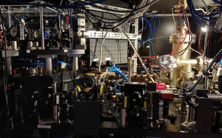 A new approach to magnify wave functions when imaging interacting ultracold atoms