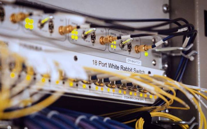 White Rabbit optical timing technology meets quantum entanglement