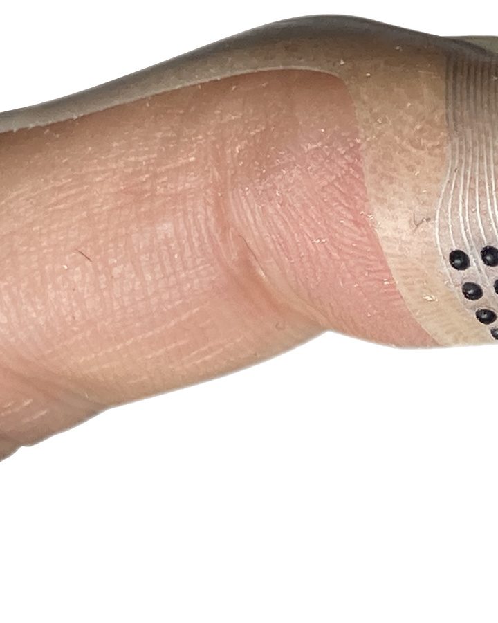 Fingertip wearable brings lifelike texture to flat digital interfaces