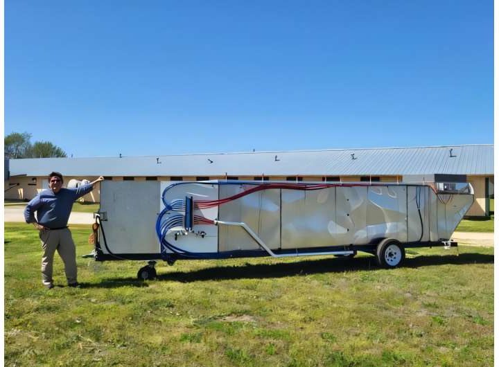 An indoor air scrubber developed to remove ammonia in poultry houses